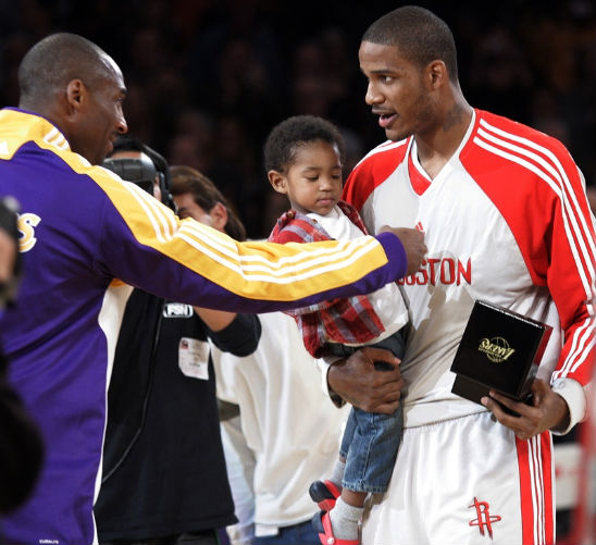 TREVOR ARIZA AND SON ARE RING BEARERS