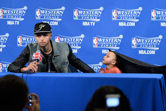 May 27, 2015; Oakland, CA, USA; Golden State Warriors guard Stephen Curry (30) and Riley Curry address the media in a press conference after game five of the Western Conference Finals of the NBA Playoffs against the Houston Rockets at Oracle Arena. Mandatory Credit: Kyle Terada-USA TODAY Sports ORG XMIT: USATSI-225546 ORIG FILE ID: 20150527_kkt_st3_010.jpg