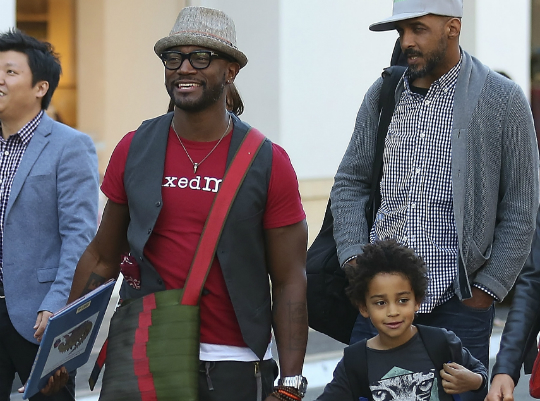 Taye diggs and son go christmas shopping.