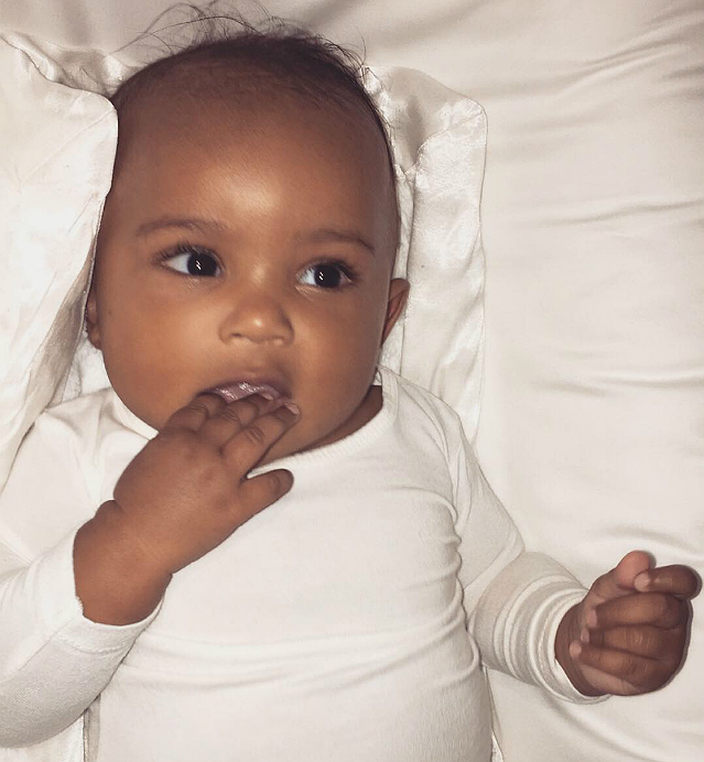 Saint West is a tad shy in this photo.