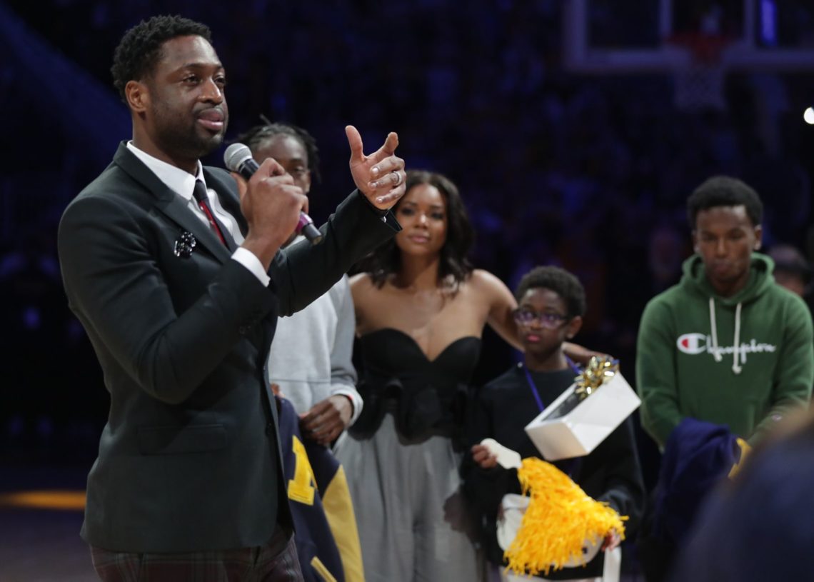 DWYANE WADE SURPRISED BY HIS KIDS AT MARQUETTE'S JERSEY RETIREMENT CEREMONY1140 x 815