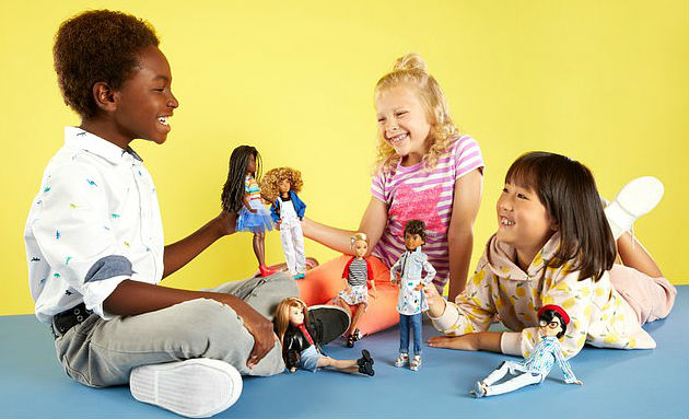 kids playing with barbie dolls