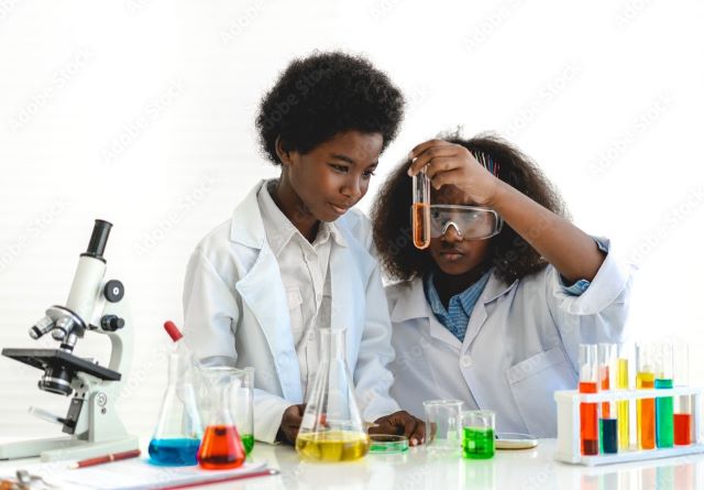 Kid scientists. ADOBE STOCK IMAGES