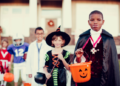Kids trick-or-treating. CANVA.COM
