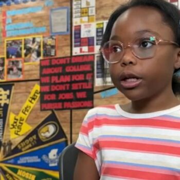 FOURTH GRADER BALANCES ELEMENTARY SCHOOL AND COLLEGE CLASSES